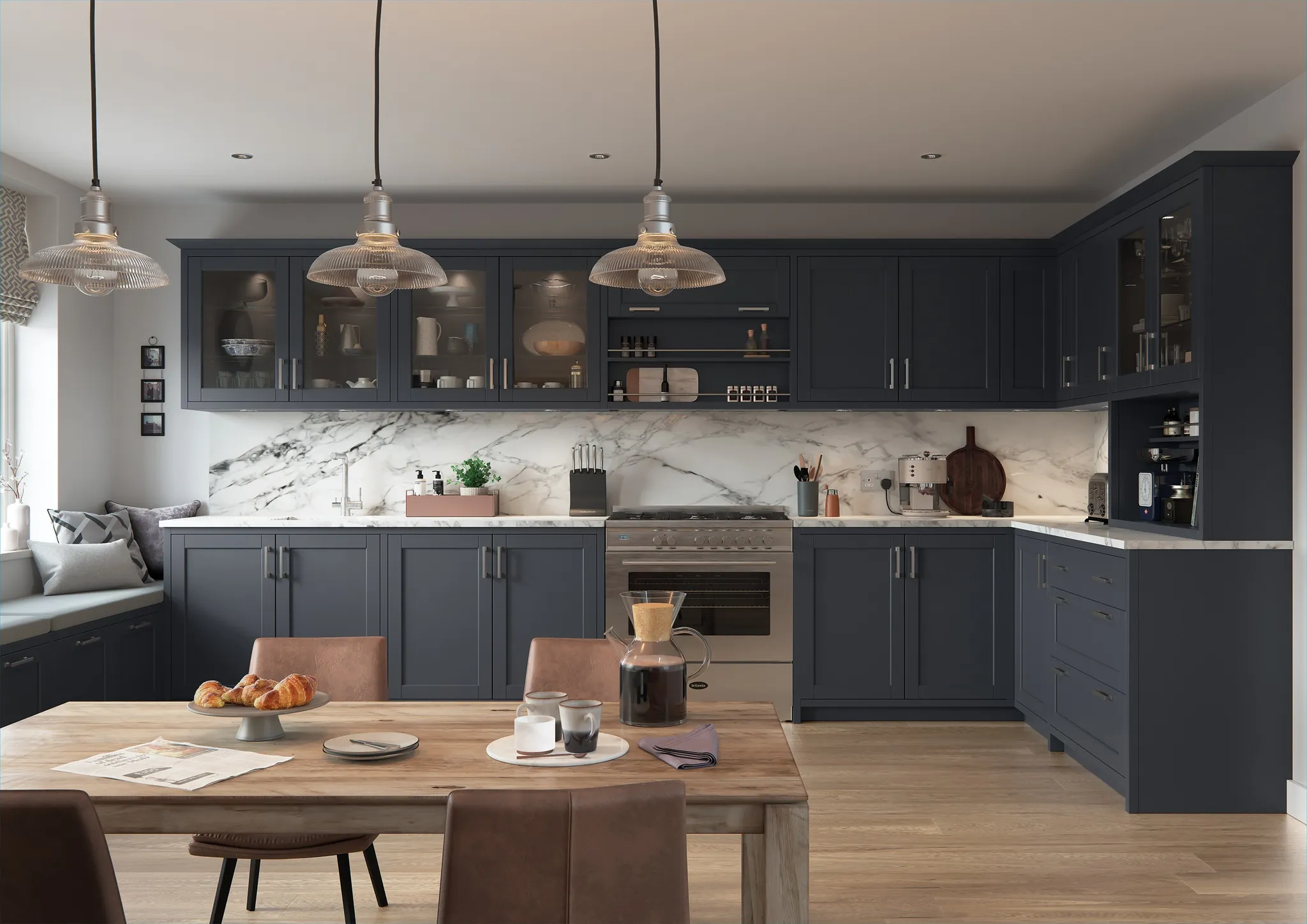 A bespoke fitted kitchen by Northwich Kitchens with marble worktops and hand-painted cabinetry